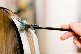 At the hairdresser ÃÂ¢Ã?Ã? woman gets new hair colour; close-up on strand of hair; Shutterstock ID 71791408; PO: angelikiJ-for Jordan Muto